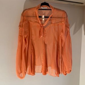 Tana Gill size L, sheer and  tropical colored top. Never been worn with tags